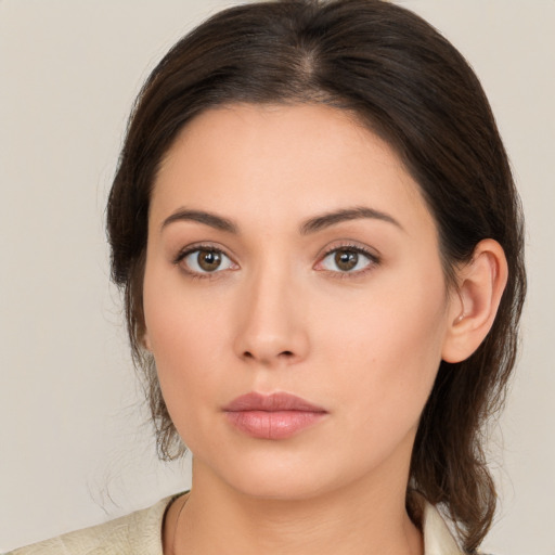 Neutral white young-adult female with medium  brown hair and brown eyes