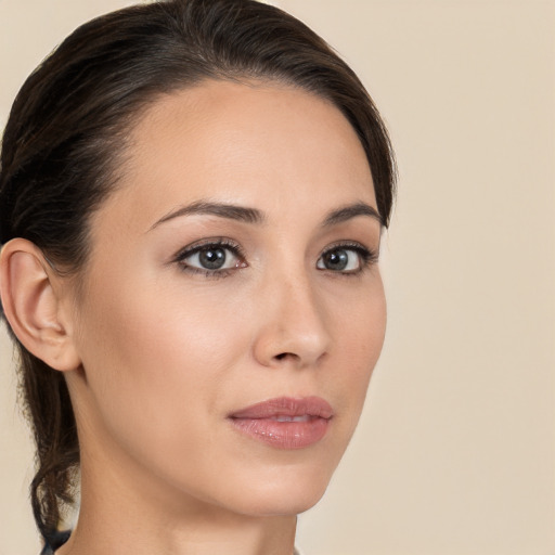 Neutral white young-adult female with medium  brown hair and brown eyes