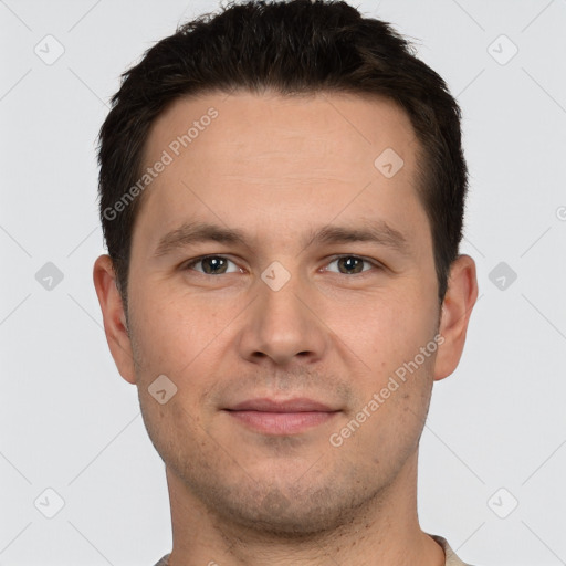 Joyful white young-adult male with short  brown hair and brown eyes