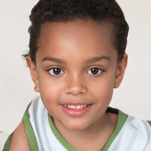 Joyful white child female with short  brown hair and brown eyes