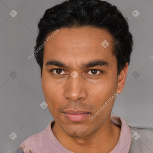 Neutral white young-adult male with short  black hair and brown eyes
