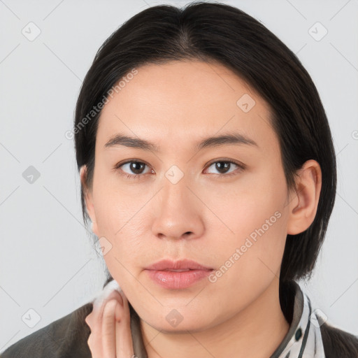 Neutral white young-adult female with medium  brown hair and brown eyes