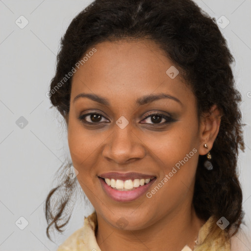 Joyful black young-adult female with medium  brown hair and brown eyes