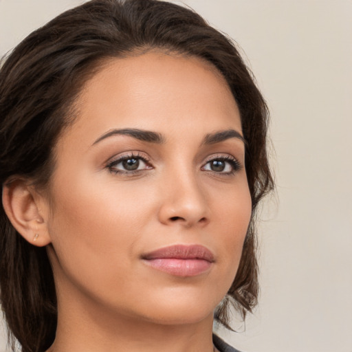 Neutral white young-adult female with medium  brown hair and brown eyes