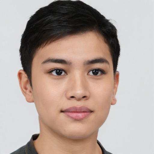Joyful latino young-adult male with short  brown hair and brown eyes