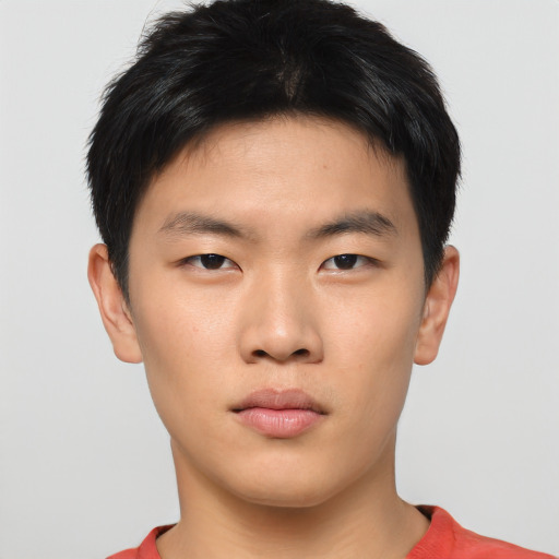 Neutral asian young-adult male with short  brown hair and brown eyes
