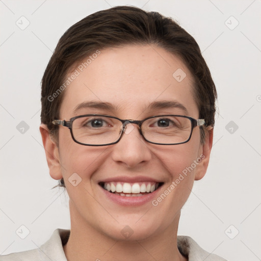 Joyful white young-adult female with short  brown hair and grey eyes