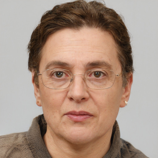 Joyful white middle-aged male with short  brown hair and grey eyes