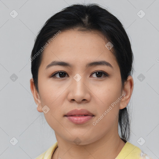 Joyful white young-adult female with medium  brown hair and brown eyes