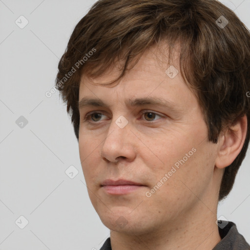 Neutral white adult male with short  brown hair and brown eyes