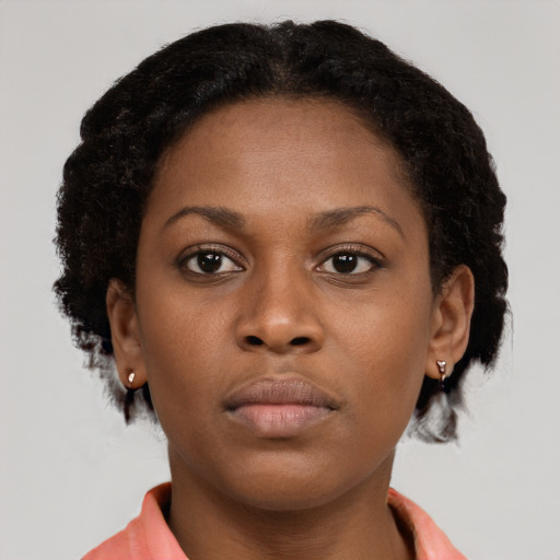 Neutral black young-adult female with short  brown hair and brown eyes