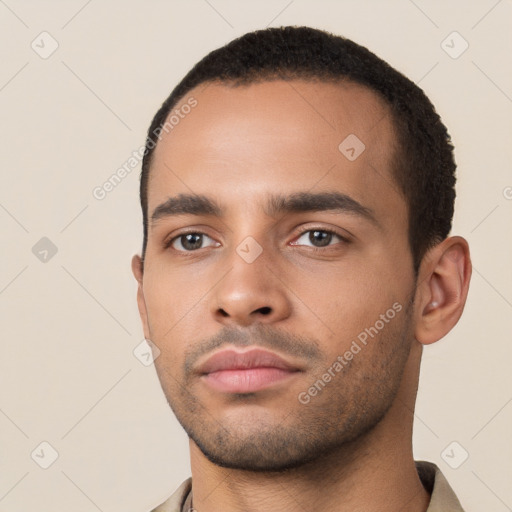 Neutral latino young-adult male with short  black hair and brown eyes