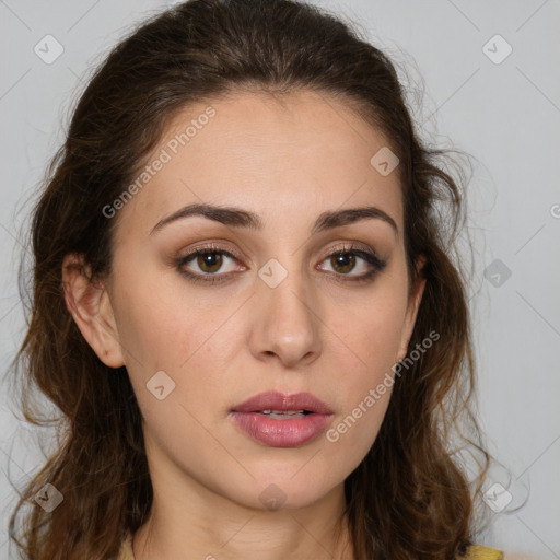 Joyful white young-adult female with long  brown hair and green eyes