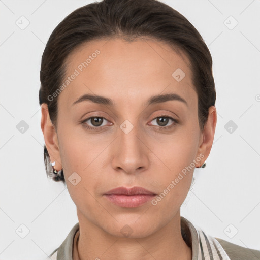 Neutral white young-adult female with short  brown hair and brown eyes