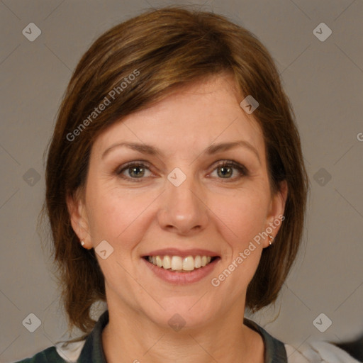 Joyful white adult female with medium  brown hair and grey eyes