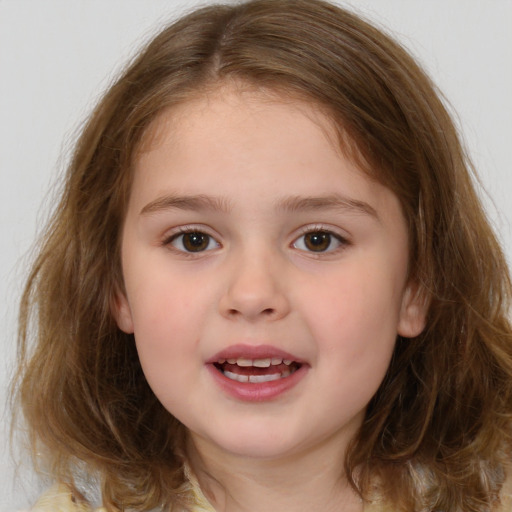 Joyful white child female with medium  brown hair and brown eyes