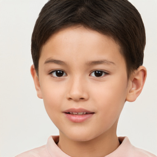 Joyful white child female with short  brown hair and brown eyes