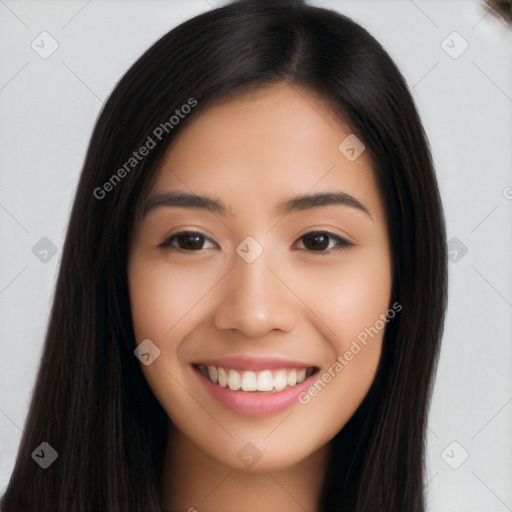 Joyful latino young-adult female with long  brown hair and brown eyes