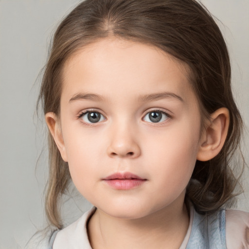 Neutral white child female with medium  brown hair and brown eyes