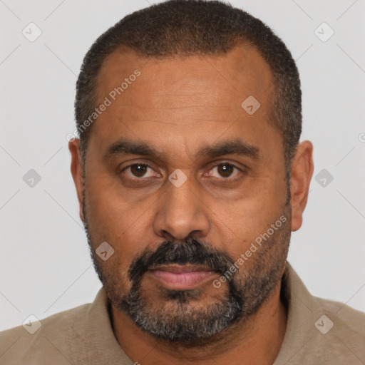 Neutral black adult male with short  brown hair and brown eyes