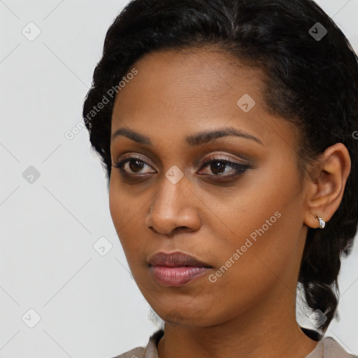 Neutral black young-adult female with short  black hair and brown eyes