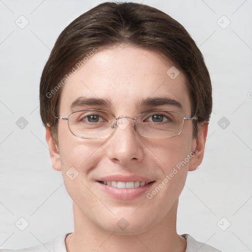 Joyful white young-adult female with short  brown hair and grey eyes