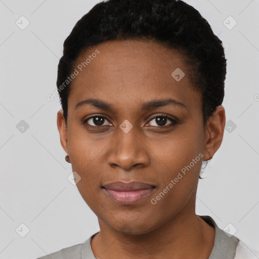 Joyful black young-adult female with short  black hair and brown eyes