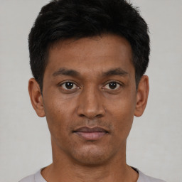 Neutral asian young-adult male with short  black hair and brown eyes