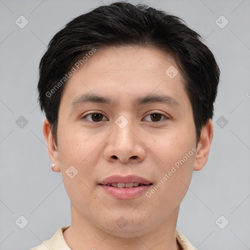 Joyful asian young-adult male with short  brown hair and brown eyes