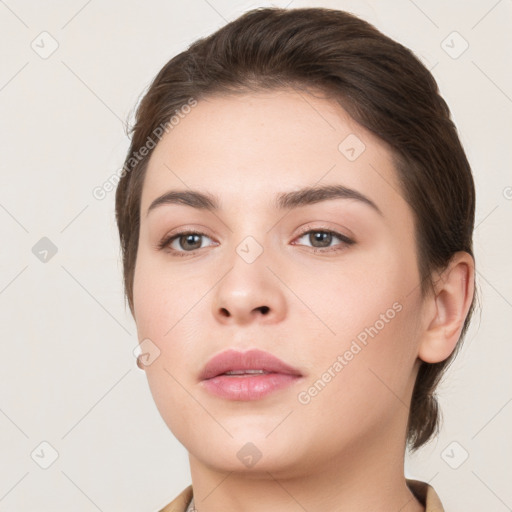 Neutral white young-adult female with medium  brown hair and brown eyes