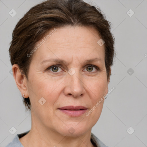 Joyful white adult female with short  brown hair and grey eyes