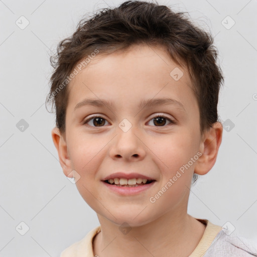 Joyful white child male with short  brown hair and brown eyes