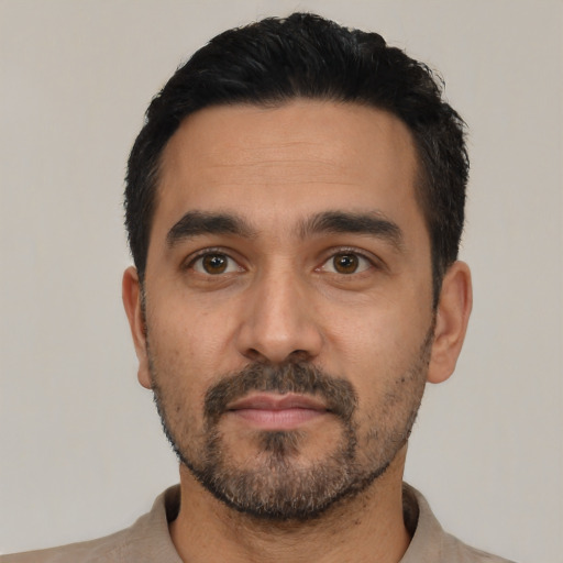 Neutral latino young-adult male with short  black hair and brown eyes