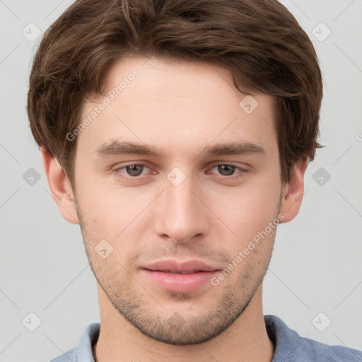 Neutral white young-adult male with short  brown hair and grey eyes