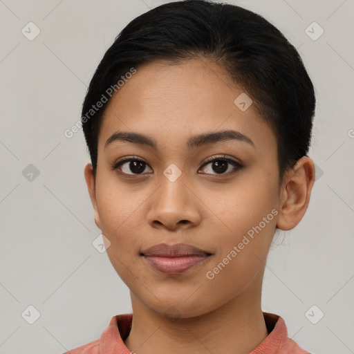 Joyful latino young-adult female with short  brown hair and brown eyes