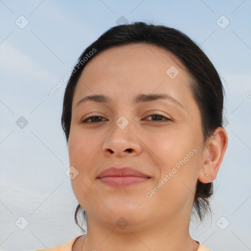 Joyful white young-adult female with short  brown hair and brown eyes