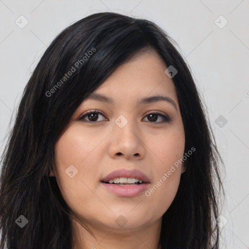 Joyful asian young-adult female with long  black hair and brown eyes