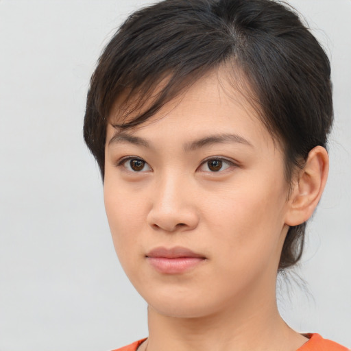 Neutral asian young-adult female with medium  brown hair and brown eyes