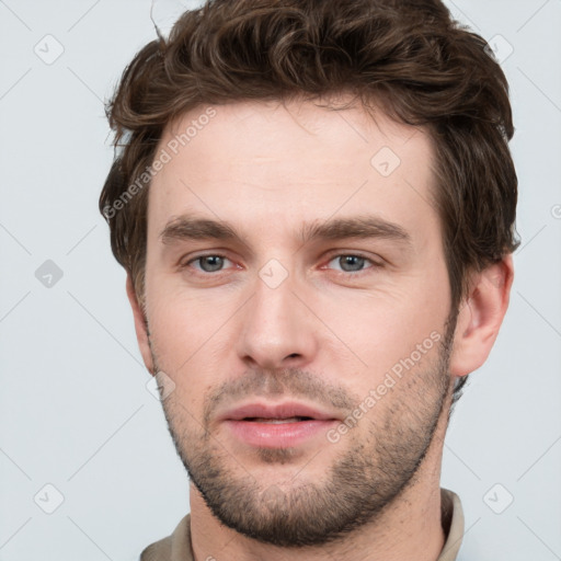 Neutral white young-adult male with short  brown hair and grey eyes