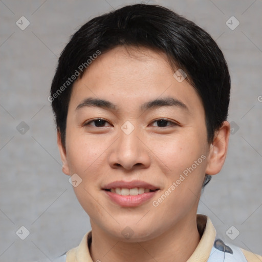 Joyful asian young-adult male with short  brown hair and brown eyes