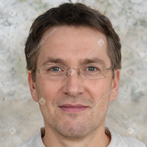 Joyful white adult male with short  brown hair and grey eyes