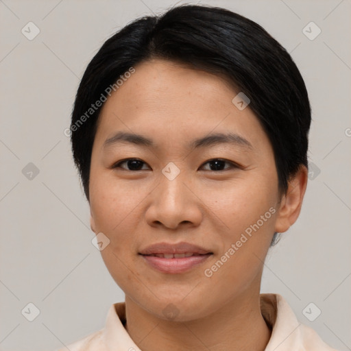 Joyful asian young-adult female with short  black hair and brown eyes