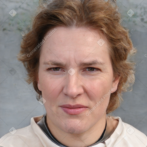 Joyful white adult female with medium  brown hair and blue eyes