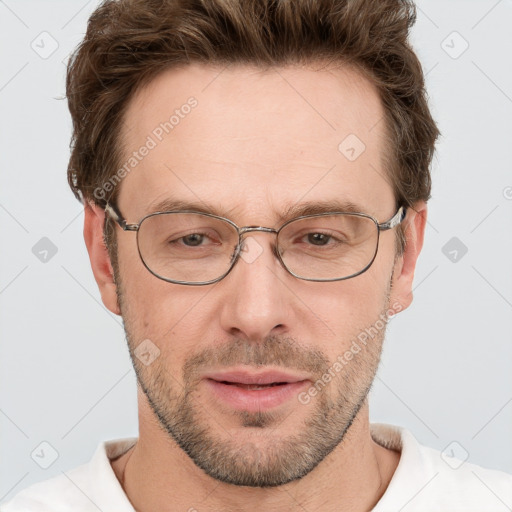 Joyful white adult male with short  brown hair and grey eyes