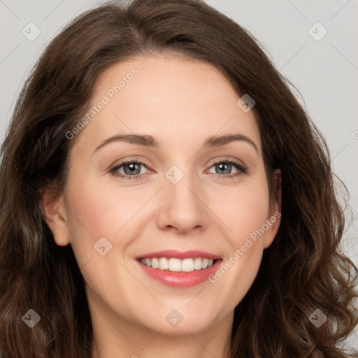 Joyful white young-adult female with long  brown hair and green eyes