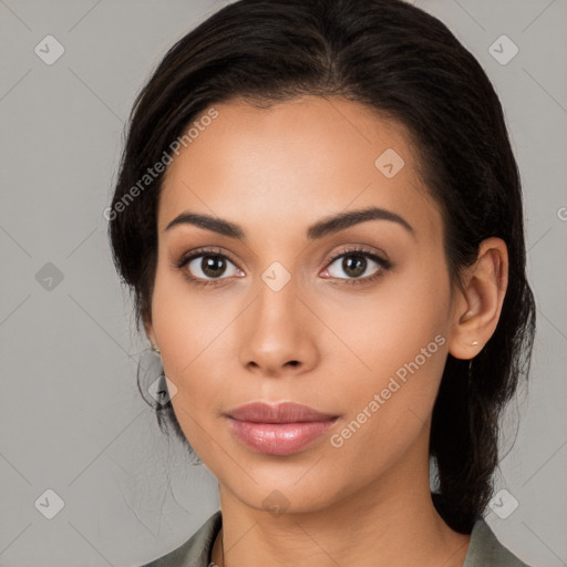 Neutral latino young-adult female with medium  brown hair and brown eyes