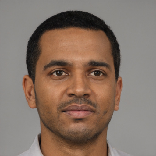 Neutral black young-adult male with short  black hair and brown eyes