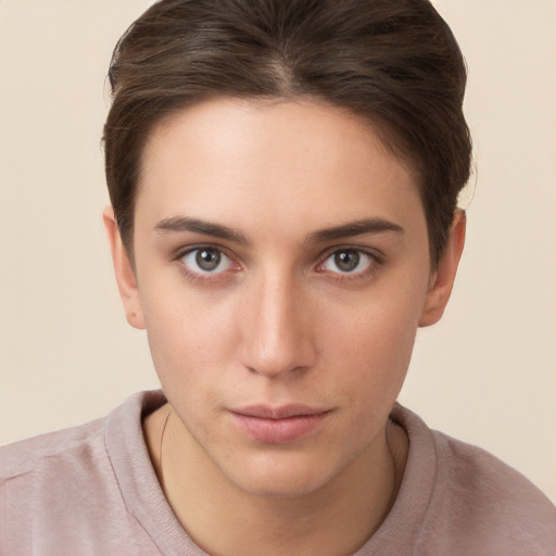 Neutral white young-adult female with short  brown hair and brown eyes