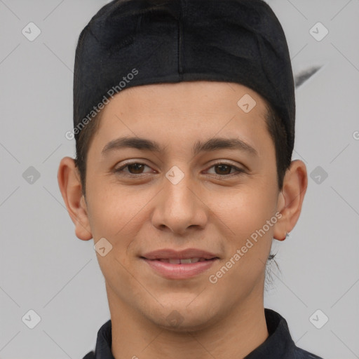 Joyful white young-adult male with short  black hair and brown eyes