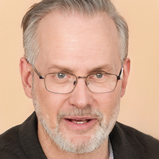 Joyful white middle-aged male with short  gray hair and grey eyes